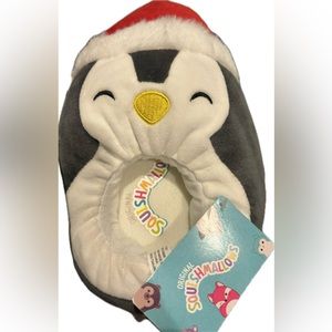 The original Squishmallow penguin slipper
